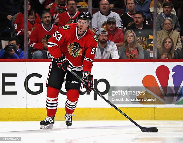 Brandon Mashinter of the Chicago Blackhawks looks to pass against the Boston Bruins at the United Center on April 3, 2016 in Chicago, Illinois. The...