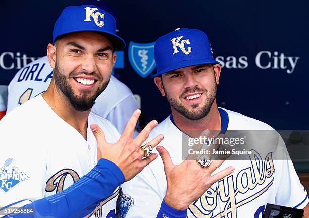 Eric Hosmer and Mike Moustakas of the Kansas City Royals pose with their World Series Championship rings after a ring ceremony prior to the game...