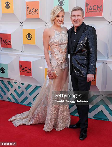 Personalities Todd Chrisley and Savannah Chrisley arrive at the 51st Academy Of Country Music Awards at MGM Grand Garden Arena on April 3, 2016 in...