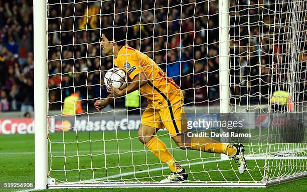 Luis Suarez of Barcelona celebrates as he scores their first and equalising goal during the UEFA Champions League quarter final first leg match...