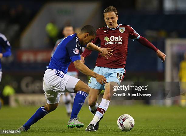 Matthew Taylor of Burnley takes on Lee Peltier of Cardiff City during the Sky Bet Championship match between Burnley and Cardiff City at Turf Moor on...