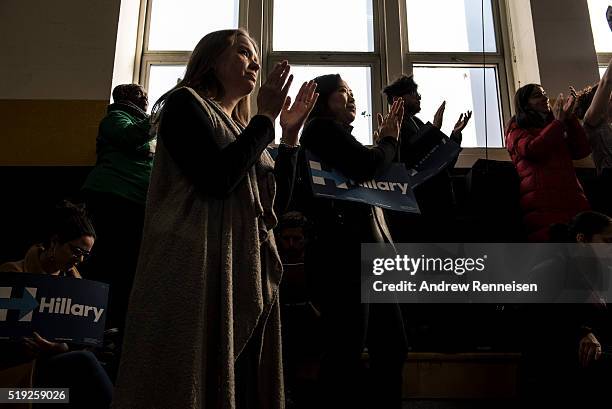 Supporters applaud at a Women for Hillary Town Hall meeting for Democratic Presidential Candidate Hillary Clinton with New York City First Lady...