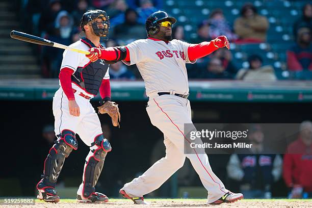 Catcher Yan Gomes of the Cleveland Indians watches as David Ortiz of the Boston Red Sox hits a two-run home run during the ninth inning of the...