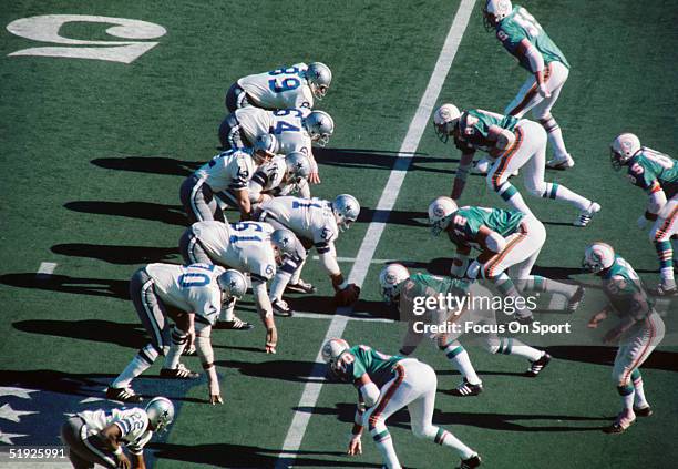 Dallas Cowboys' quarterback Roger Staubach prepares to snap at the scrimmage line during Super Bowl XI against the Miami Dolphins at Tulane Stadium...