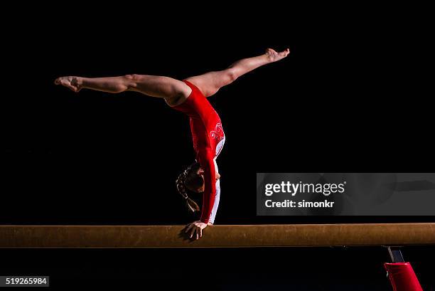 female gymnast in sports hall - legs apart stock pictures, royalty-free photos & images