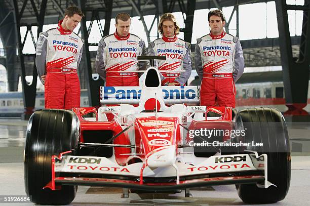 Drivers Ralf Schumacher, Ricardo Zonta, Jarno Trulli and Olivier Panis inspect the back of the new TF105 F1 Car, during the Panasonic Toyota Racing...