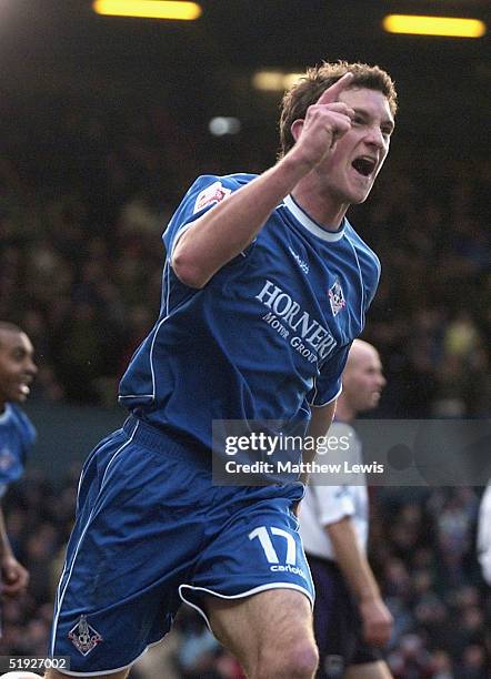 Scott Vernon of Oldham celebrates his goal during the FA Cup third round match between Oldham Athletic and Manchester City at Boundary Park on...