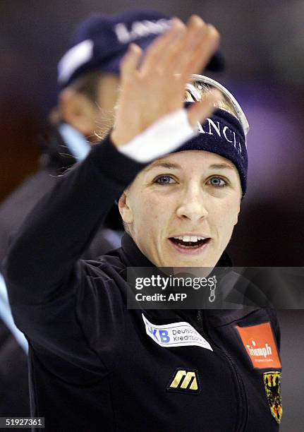 Germany's Anni Friesinger waves after wnning the 3000 meters in the European Championships Speed Skating Allround 2005 at the Thialf Icestadium in...