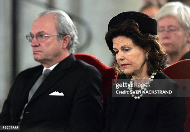 Swedish King Carl Gustaf and Queen Silvia attends a memorial service for the Tsunami victims in Uppsala Cathedral 08 January 2004. Their daughter...