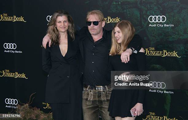 Ben Becker with Anne Seidel and daughter Lilith attend the 'The Jungle Book' Germany premiere on April 5, 2016 in Berlin, Germany.