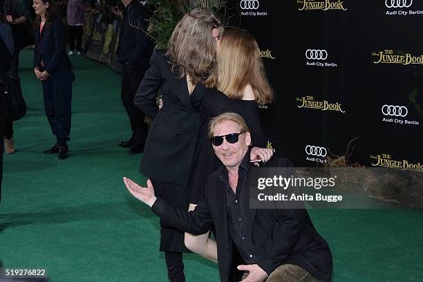 Ben Becker with Anne Seidel and daughter Lilith attend the 'The Jungle Book' Germany premiere on April 5, 2016 in Berlin, Germany.