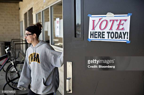 Resident exits a polling location during the presidential primary vote in Waukesha, Wisconsin, U.S., on Tuesday, April 5, 2016. Wisconsin voters went...