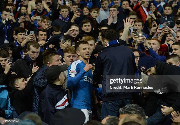 Andy Halliday of Rangers celebrates with the crowd as Rangers beat Dumbarton 1-0 to clinch the Scottish Championship title during the match between...