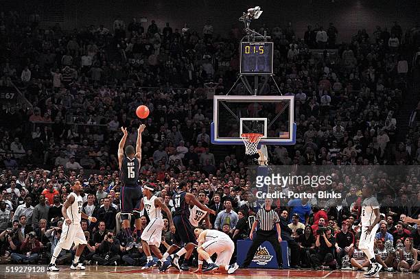 Big East Tournament: Rear view of UConn Kemba Walker in action, making last second, game winning shot for buzzer beater vs Pittsburgh at Madison...
