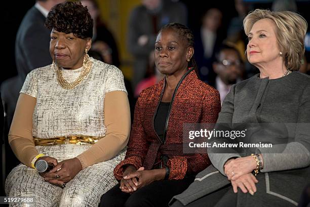 Gwen Carr, the mother of Eric Garner, New York City first lady Chirlane McCray, and Democratic presidential candidate Hillary Clinton sit together...