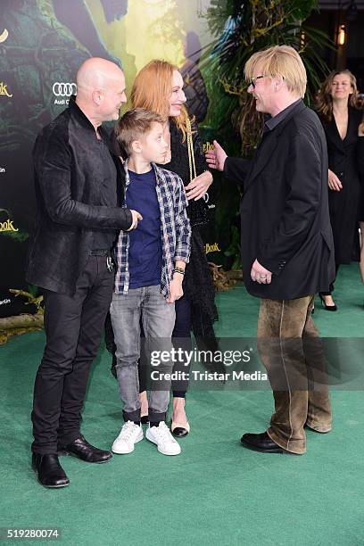 Christian Berkel and Andrea Sawatzki with their son Bruno Sawatzki and Ben Becker attend the 'The Jungle Book' German Premiere on April 05, 2016 in...