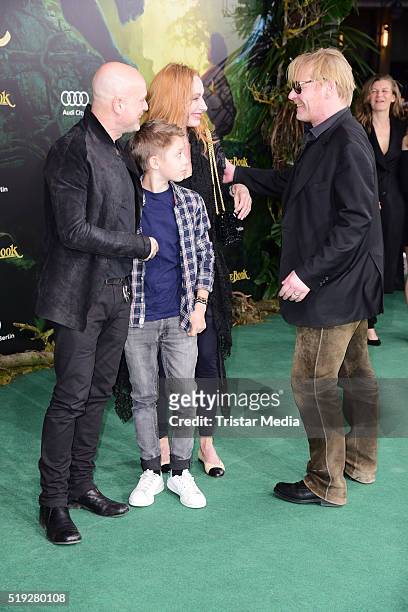 Christian Berkel and Andrea Sawatzki with their son Bruno Sawatzki and Ben Becker attend the 'The Jungle Book' German Premiere on April 05, 2016 in...