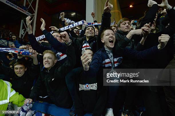 Rangers fans celebrate as Rangers beat Dumbarton 1-0 to clinch the Scottish Championship title during the match between Glasgow Rangers FC and...