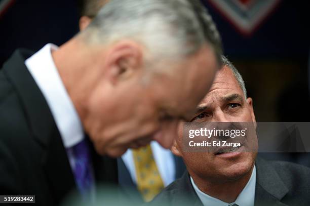 Major League Commissioner Rob Manfred listens to Kansas City Royals General Manager Dayton Moore prior to the World Series Championship rings...