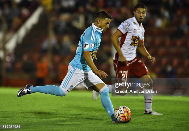 Hugo Nervo of Huracan fights for the ball with Gabriel Costa of Sporting Cristal during a match between Huracan and Sporting Cristal as part of Group...