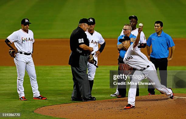 Wei-Yin Chen of the Miami Marlins is looked at by manager Don Mattingly after being hit during 2016 Opening Day against the Detroit Tigers at Marlins...