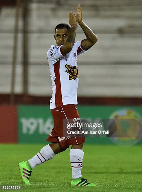 Daniel Montenegro of Huracan greets the crowd while being substituted during a match between Huracan and Sporting Cristal as part of Group of Copa...