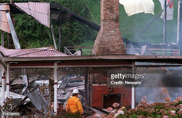 View of the still-smoking remains of the Seascape Guesthouse, where Port Arthur massacre gunman Martin Bryant hid before his capture, Port Arthur,...