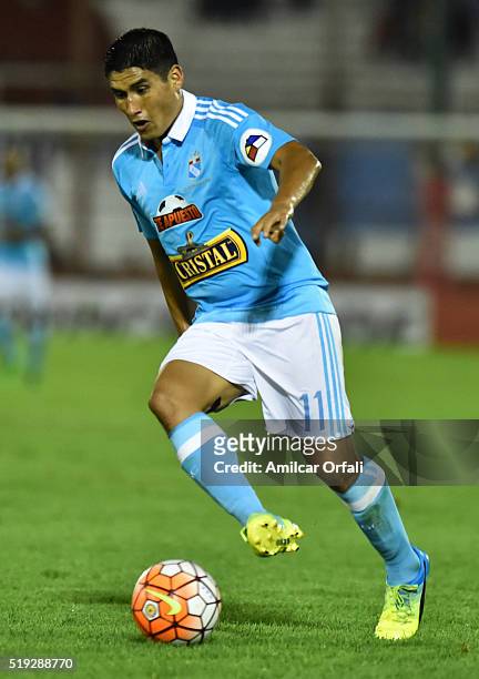 Irven Avila of Sporting Cristal drives the ball during a match between Huracan and Sporting Cristal as part of Group of Copa Bridgestone Libertadores...