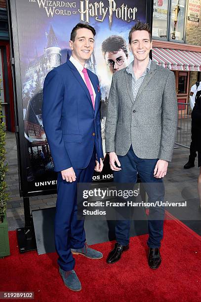 Wizarding World of Harry Potter Attraction Opening -- Pictured: Actors Oliver Phelps and James Phelps arrive at the opening of the 'Wizarding World...