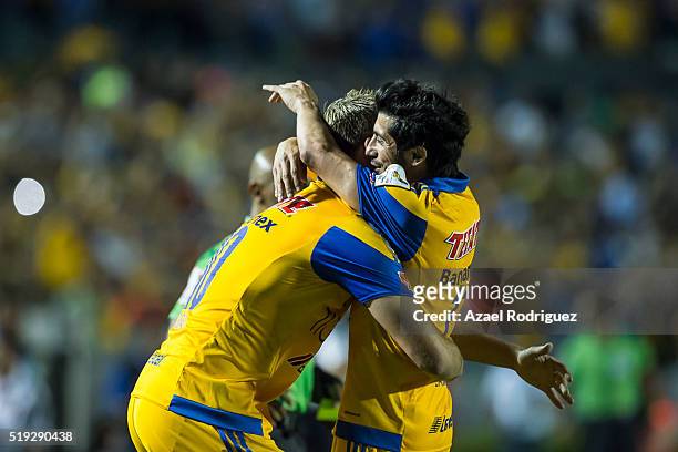 Andre Gignac of Tigres celebrates with teammate Damian Alvarez after scoring his team's second goal during the semifinals second leg match between...