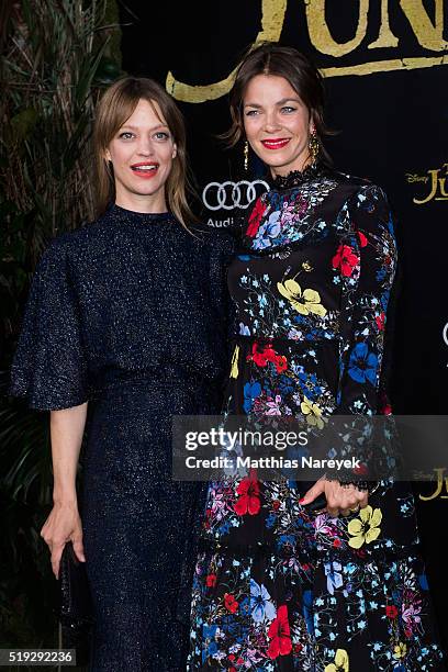 Heike Makatsch and Jessica Schwarz attend the 'The Jungle book' German Premiere on April 5, 2016 in Berlin, Germany.