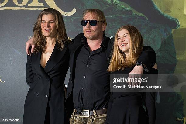 Ben Becker, Anne Seidel and daughter Lllith attend the 'The Jungle book' German Premiere on April 5, 2016 in Berlin, Germany.