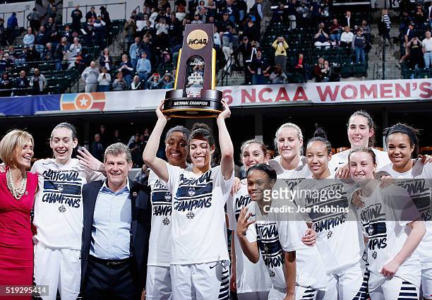 The Connecticut Huskies celebrate with the trophy after their 82-51 victory over the Syracuse Orange to win the championship game of the 2016 NCAA...