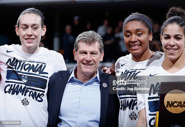 Breanna Stewart, head coach Geno Auriemma, Morgan Tuck and Kia Nurse of the Connecticut Huskies celebrate with the trophy after their 82-51 victory...