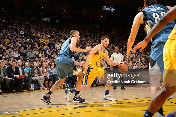 Klay Thompson of the Golden State Warriors drives against Tayshaun Prince of the Minnesota Timberwolves on April 5, 2016 at Oracle Arena in Oakland,...