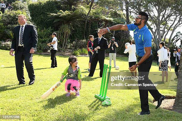 Australian cricketer Gurinder Sandhu plays cricket with young children during the launch of the Asian Sports Partnership Program Launch at Kirribilli...