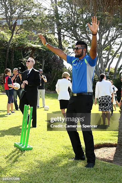 Australian cricketer Gurinder Sandhu plays cricket with young children during the launch of the Asian Sports Partnership Program Launch at Kirribilli...