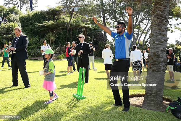 Australian cricketer Gurinder Sandhu plays cricket with young children during the launch of the Asian Sports Partnership Program Launch at Kirribilli...