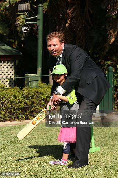 Federal Member for Reid Craig Laundy MP plays cricket with young children during the launch of the Asian Sports Partnership Program Launch at...