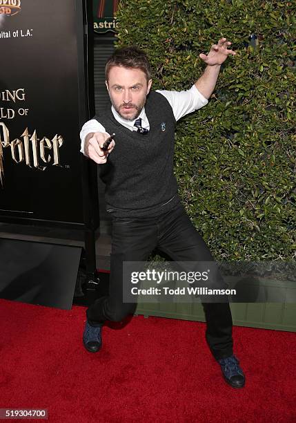 Chris Hardwick plays with a wand at the Opening Of "The Wizarding World Of Harry Potter" at Universal Studios Hollywood on April 5, 2016 in Universal...