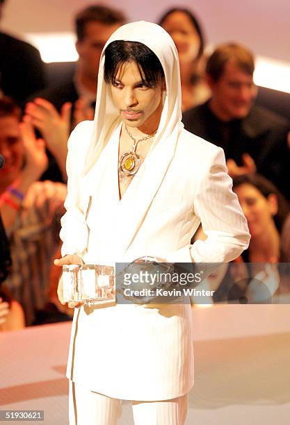 Singer Prince presents an award on stage during the 31st Annual People's Choice Awards at the Pasadena Civic Auditorium on January 9, 2005 in...