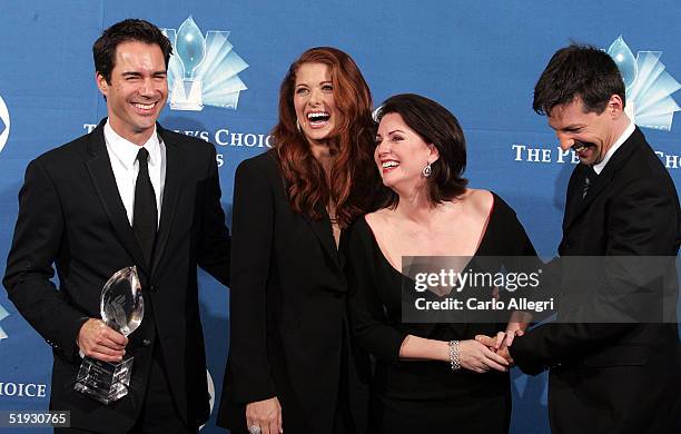 Eric McCormack, Debra Messing, Megan Mullally and Sean Hayes pose with Favorite TV Comedy award during the 31st Annual People's Choice Award at the...