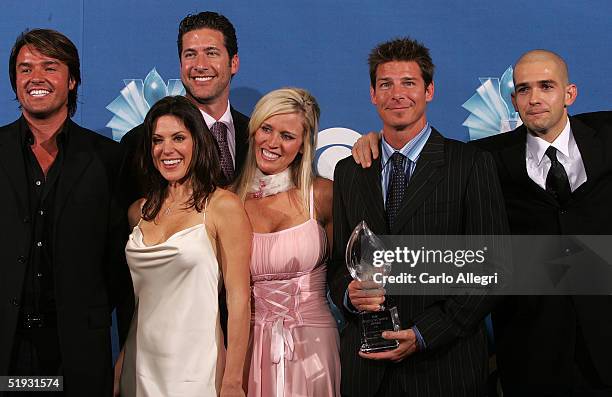Ty Pennington and the cast of "Extreme Makeover: Home Edition" poses with the Favorite Reality Show/ Makeover during the 31st Annual People's Choice...
