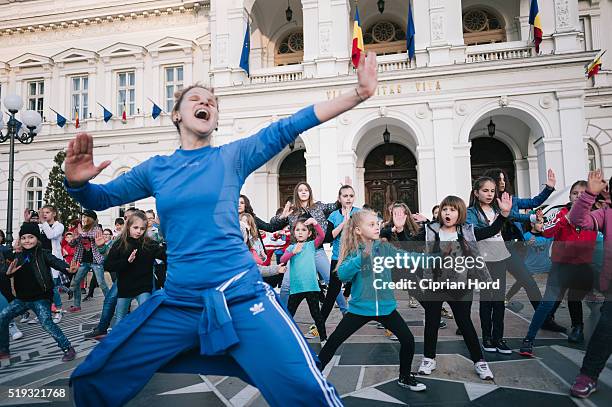 Children dance zumba in Celebration Of World Autism Awareness Day on April 2, 2016 in Arad, Romania.