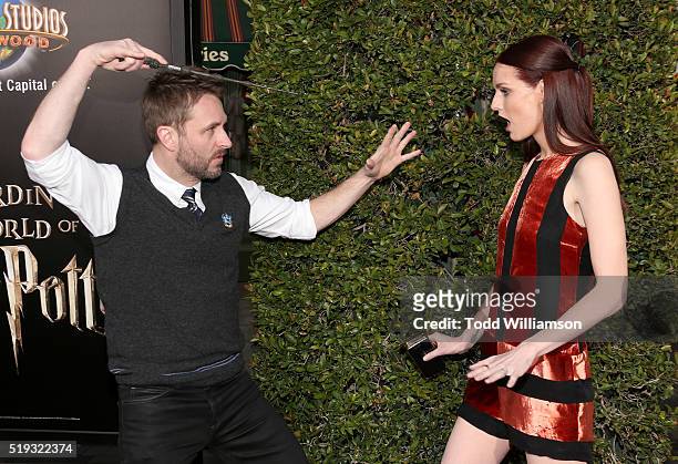 Chris Hardwick and Lydia Hearst play with a wand at the Opening Of "The Wizarding World Of Harry Potter" at Universal Studios Hollywood on April 5,...