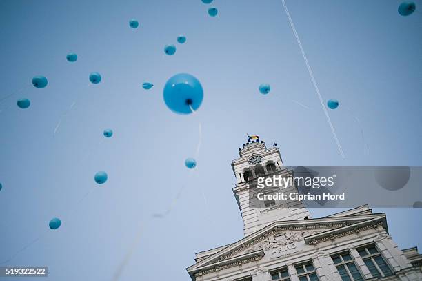 Children launch blue balloons in Celebration Of World Autism Awareness Day on April 2, 2016 in Arad, Romania.