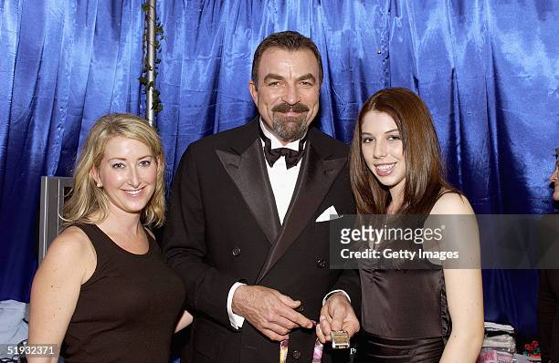 Actor Tom Selleck and his daughter Hannah pose at the Jacqui Chazen Designs Ribbon Watches lounge at the Distinctive Assets Gift Lounge during the...