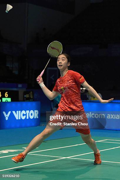 Wang Shixian of China plays to Minatsu Mitani of Japan in the Women Singles during round one of the BWF World Super Series Badminton Malaysia Open at...