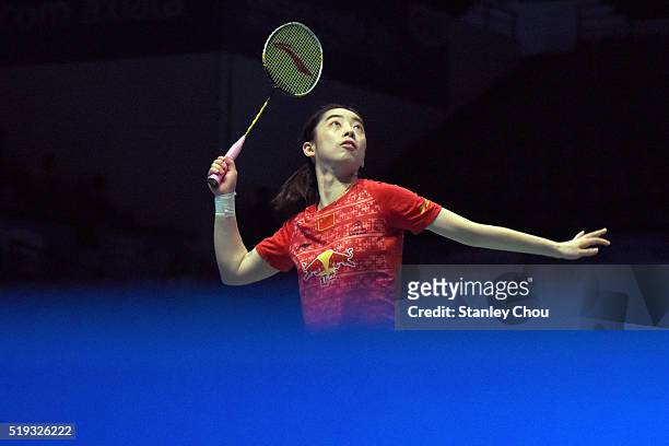 Wang Shixian of China watches the shuttle during her match against Minatsu Mitani of Japan in the Women Singles during round one of the BWF World...