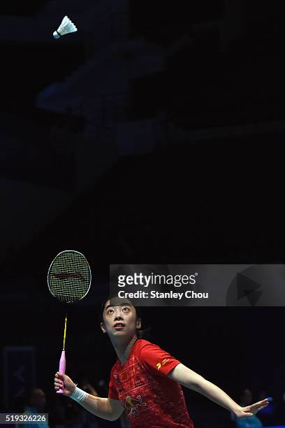 Wang Shixian of China plays to Minatsu Mitani of Japan in the Women Singles during round one of the BWF World Super Series Badminton Malaysia Open at...